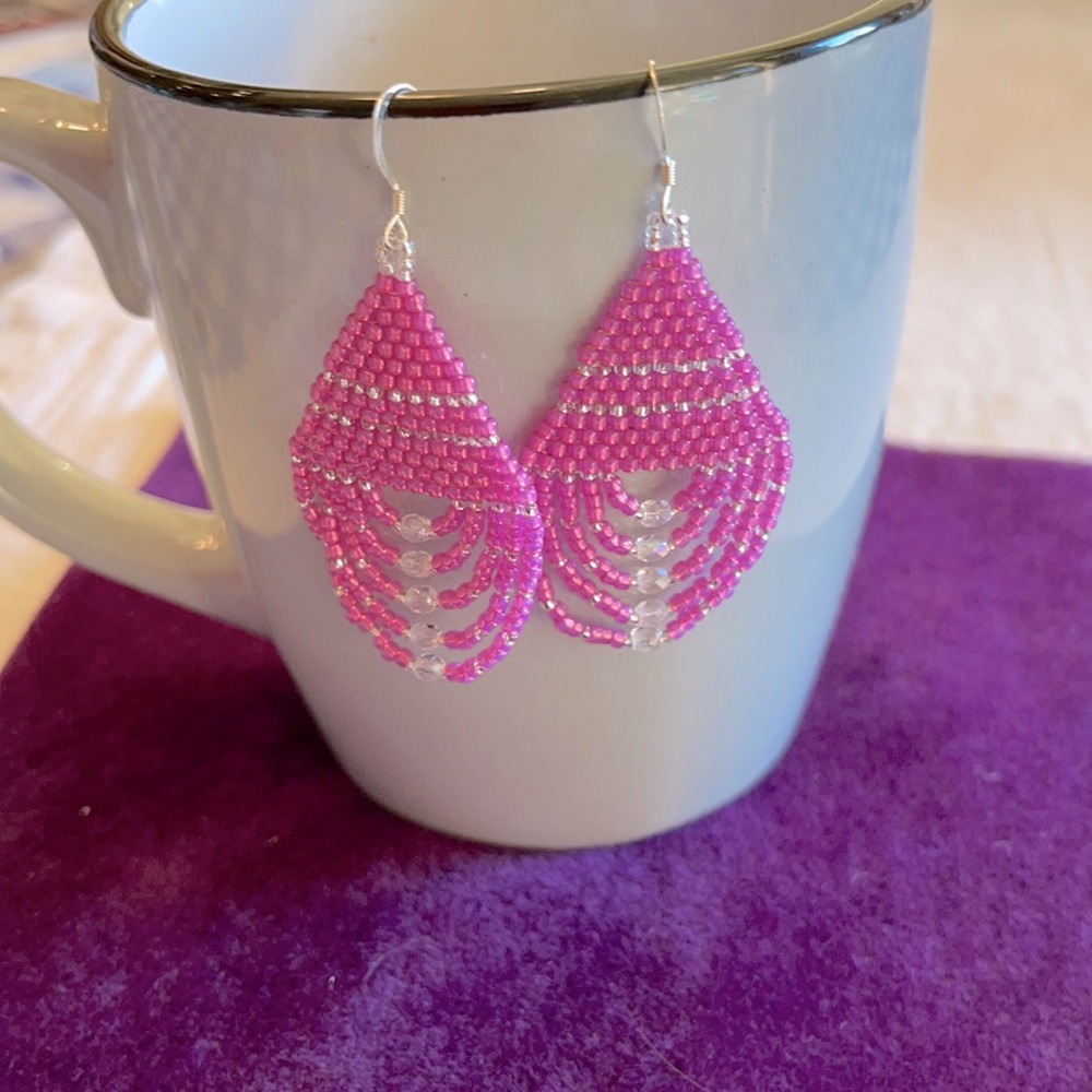 Hand beaded tear drop earrings.